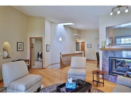 247 Hamptons Park Nw, Calgary, AB - Indoor Photo Showing Living Room With Fireplace