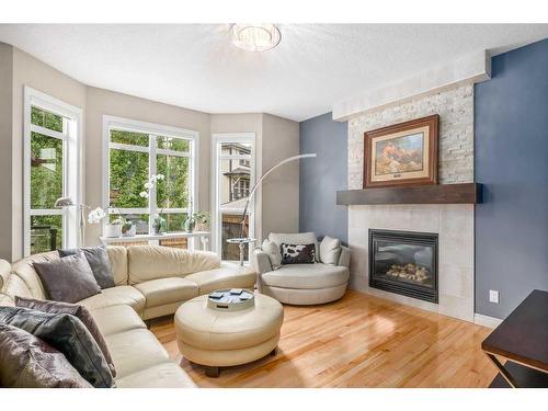 462 Mahogany Terrace Se, Calgary, AB - Indoor Photo Showing Living Room With Fireplace