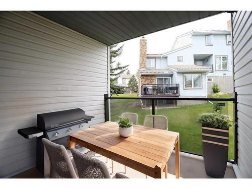 205 Coachway Lane Sw, Calgary, AB - Outdoor With Deck Patio Veranda With Exterior