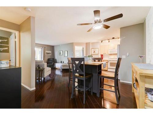 8423-304 Mackenzie Way Sw, Airdrie, AB - Indoor Photo Showing Dining Room