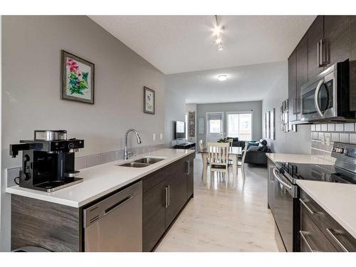 23 Nolancrest Gate Nw, Calgary, AB - Indoor Photo Showing Kitchen With Double Sink