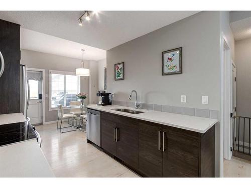 23 Nolancrest Gate Nw, Calgary, AB - Indoor Photo Showing Kitchen With Double Sink