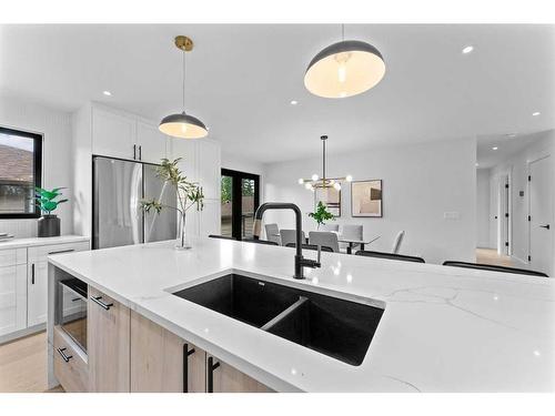 223 Parkside Way Se, Calgary, AB - Indoor Photo Showing Kitchen With Double Sink