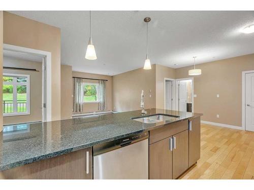 137-11 Millrise Drive Sw, Calgary, AB - Indoor Photo Showing Kitchen With Double Sink