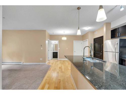 137-11 Millrise Drive Sw, Calgary, AB - Indoor Photo Showing Kitchen With Double Sink With Upgraded Kitchen