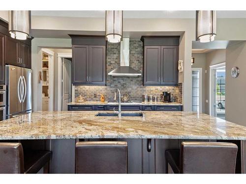 69 Waters Edge Drive, Heritage Pointe, AB - Indoor Photo Showing Kitchen With Upgraded Kitchen