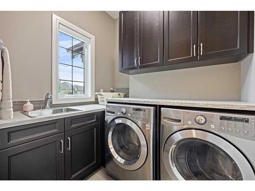69 Waters Edge Drive, Heritage Pointe, AB - Indoor Photo Showing Laundry Room