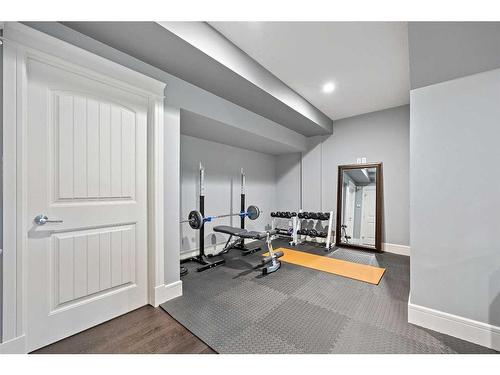 69 Waters Edge Drive, Heritage Pointe, AB - Indoor Photo Showing Gym Room