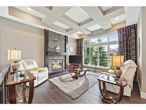 69 Waters Edge Drive, Heritage Pointe, AB - Indoor Photo Showing Living Room With Fireplace