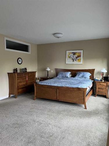 1127 Russet Road Ne, Calgary, AB - Indoor Photo Showing Bedroom