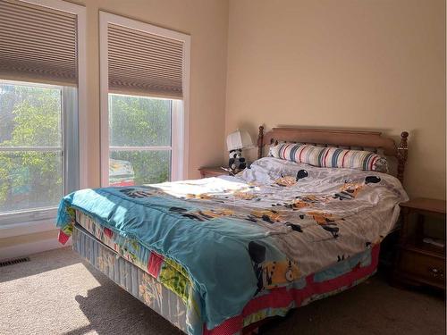 1127 Russet Road Ne, Calgary, AB - Indoor Photo Showing Bedroom