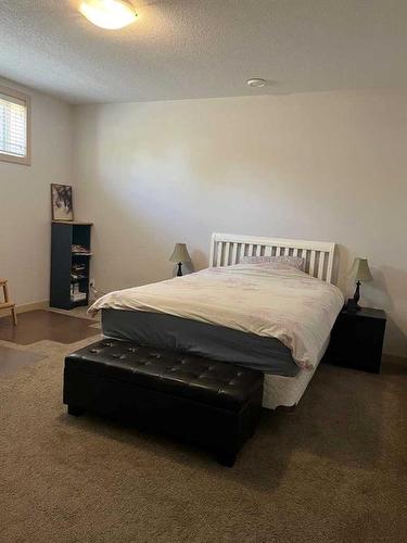 1127 Russet Road Ne, Calgary, AB - Indoor Photo Showing Bedroom