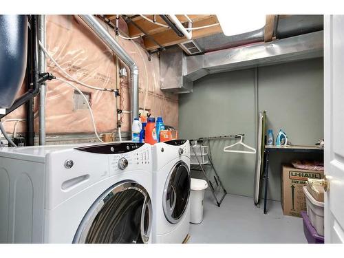 300 De Foras Close Nw, High River, AB - Indoor Photo Showing Laundry Room