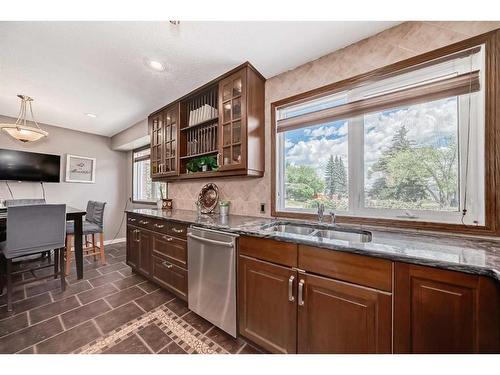 7927 Huntwick Hill Ne, Calgary, AB - Indoor Photo Showing Kitchen With Double Sink