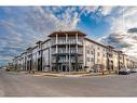 2301-681 Savanna Boulevard Ne, Calgary, AB  - Outdoor With Balcony With Facade 