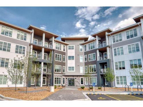 2301-681 Savanna Boulevard Ne, Calgary, AB - Outdoor With Balcony With Facade