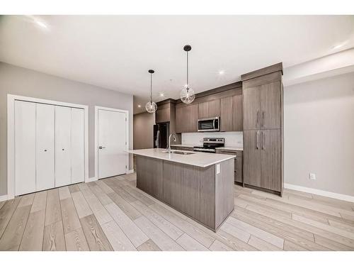 2301-681 Savanna Boulevard Ne, Calgary, AB - Indoor Photo Showing Kitchen