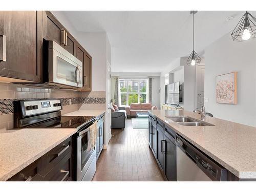 118 Legacy Boulevard Se, Calgary, AB - Indoor Photo Showing Kitchen With Double Sink With Upgraded Kitchen