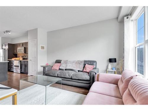 118 Legacy Boulevard Se, Calgary, AB - Indoor Photo Showing Living Room