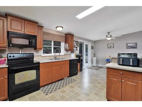 5224 Township Road 292, Rural Mountain View County, AB - Indoor Photo Showing Kitchen With Double Sink