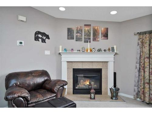 5224 Township Road 292, Rural Mountain View County, AB - Indoor Photo Showing Living Room With Fireplace