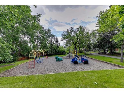 117 Strandell Crescent Sw, Calgary, AB - Outdoor With Backyard
