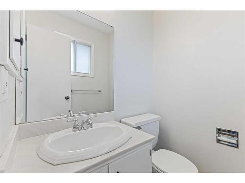 452 Queen Alexandra Way Se, Calgary, AB - Indoor Photo Showing Bathroom