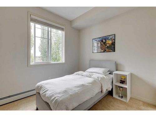 403-102 Cranberry Park Se, Calgary, AB - Indoor Photo Showing Bedroom
