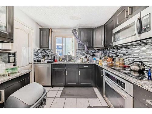 16267 5 Street Sw, Calgary, AB - Indoor Photo Showing Kitchen With Upgraded Kitchen
