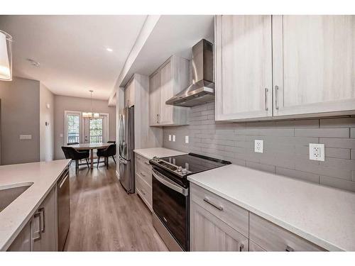 728 Sage Hill Grove Nw, Calgary, AB - Indoor Photo Showing Kitchen With Upgraded Kitchen
