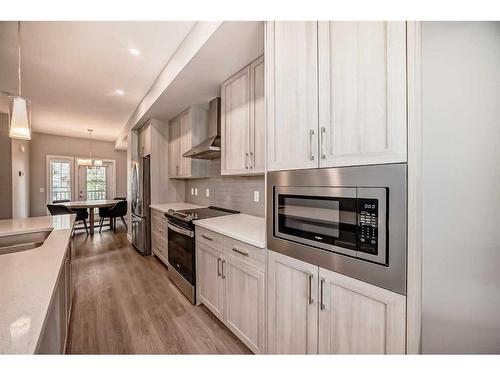 728 Sage Hill Grove Nw, Calgary, AB - Indoor Photo Showing Kitchen With Upgraded Kitchen