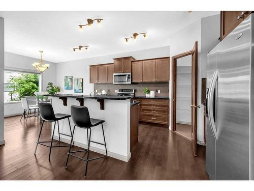 118 Aspen Hills Drive Sw, Calgary, AB - Indoor Photo Showing Kitchen With Upgraded Kitchen