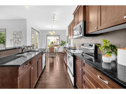 118 Aspen Hills Drive Sw, Calgary, AB - Indoor Photo Showing Kitchen With Double Sink