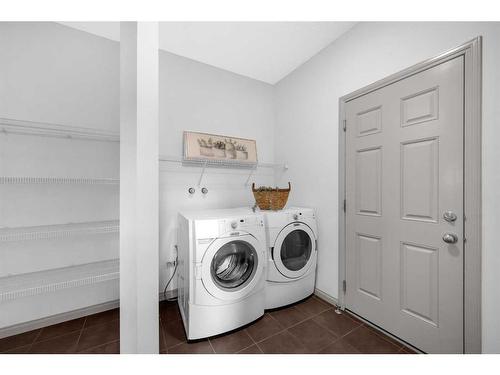 118 Aspen Hills Drive Sw, Calgary, AB - Indoor Photo Showing Laundry Room