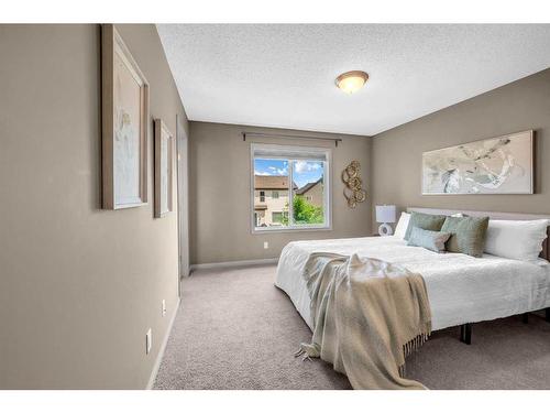 118 Aspen Hills Drive Sw, Calgary, AB - Indoor Photo Showing Bedroom