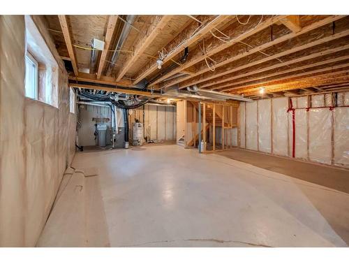 118 Aspen Hills Drive Sw, Calgary, AB - Indoor Photo Showing Basement