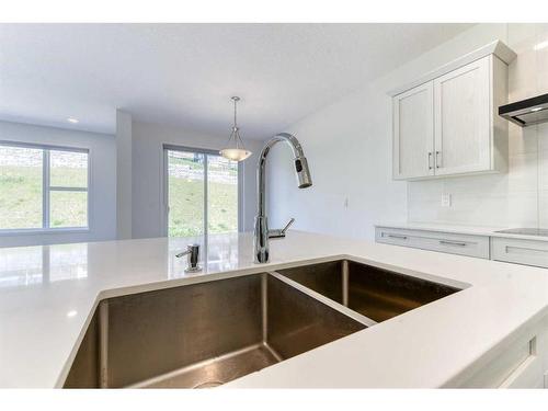 67 Arbour Lake Heights Nw, Calgary, AB - Indoor Photo Showing Kitchen