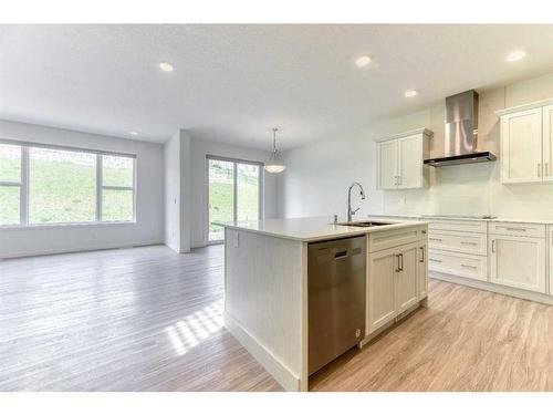 67 Arbour Lake Heights Nw, Calgary, AB - Indoor Photo Showing Kitchen With Upgraded Kitchen