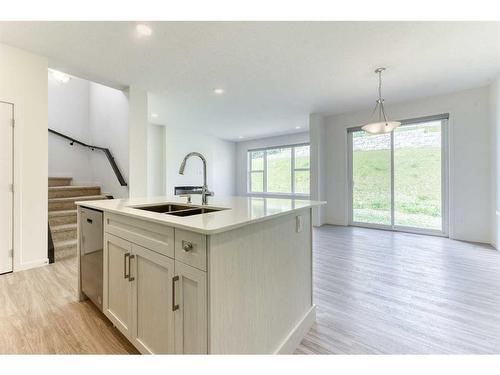 67 Arbour Lake Heights Nw, Calgary, AB - Indoor Photo Showing Kitchen With Double Sink