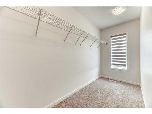 67 Arbour Lake Heights Nw, Calgary, AB - Indoor With Storage