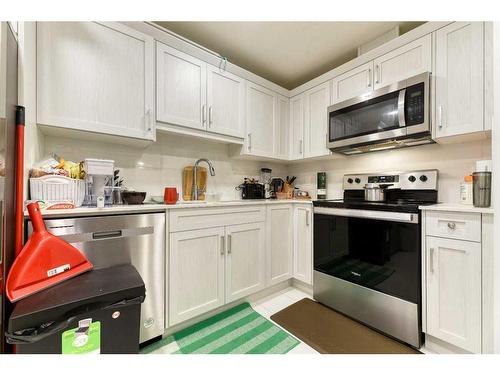 67 Arbour Lake Heights Nw, Calgary, AB - Indoor Photo Showing Kitchen