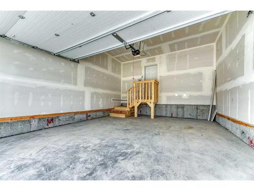 67 Arbour Lake Heights Nw, Calgary, AB - Indoor Photo Showing Garage