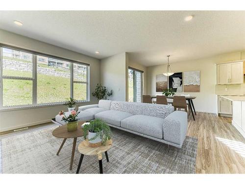 67 Arbour Lake Heights Nw, Calgary, AB - Indoor Photo Showing Living Room