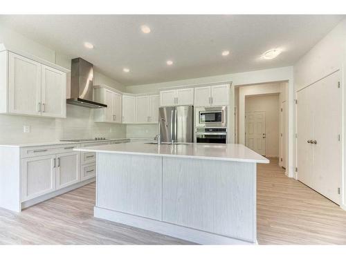 67 Arbour Lake Heights Nw, Calgary, AB - Indoor Photo Showing Kitchen With Upgraded Kitchen