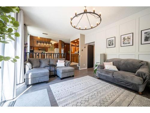 347 Woodpark Place Sw, Calgary, AB - Indoor Photo Showing Living Room