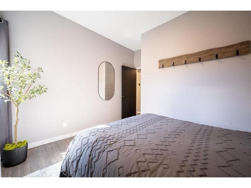 347 Woodpark Place Sw, Calgary, AB - Indoor Photo Showing Bedroom