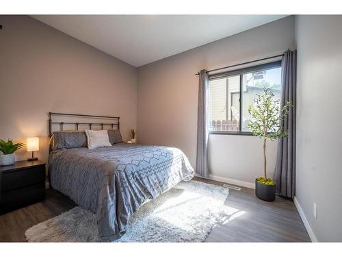 347 Woodpark Place Sw, Calgary, AB - Indoor Photo Showing Bedroom