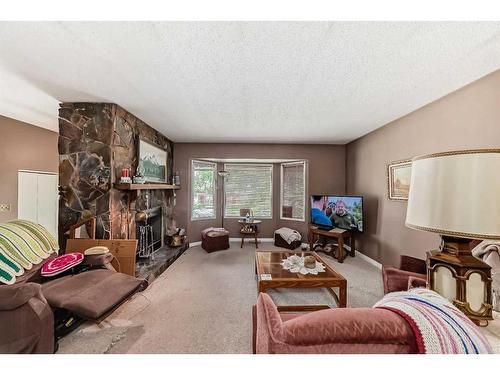 4707 Whitehorn Drive Ne, Calgary, AB - Indoor Photo Showing Living Room With Fireplace