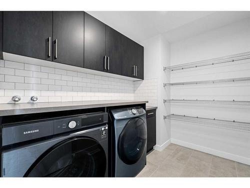 5604 37 Street Sw, Calgary, AB - Indoor Photo Showing Laundry Room