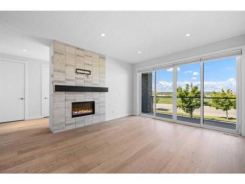 5604 37 Street Sw, Calgary, AB - Indoor Photo Showing Living Room With Fireplace